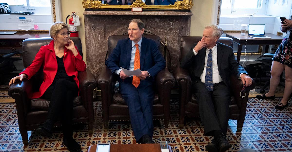 (L-R) Sen. Elizabeth Warren, Sen. Ron Wyden, Sen. Angus King