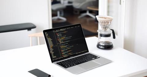 A laptop with coding on it