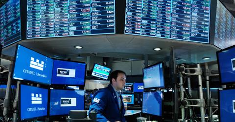 Stock trader looking at quotes