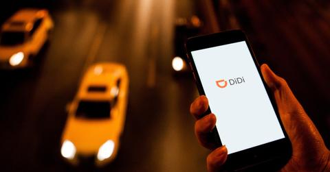 Didi global app over cars moving on road