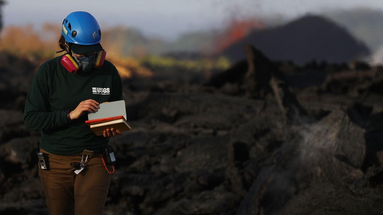 A geologist working near a volcano