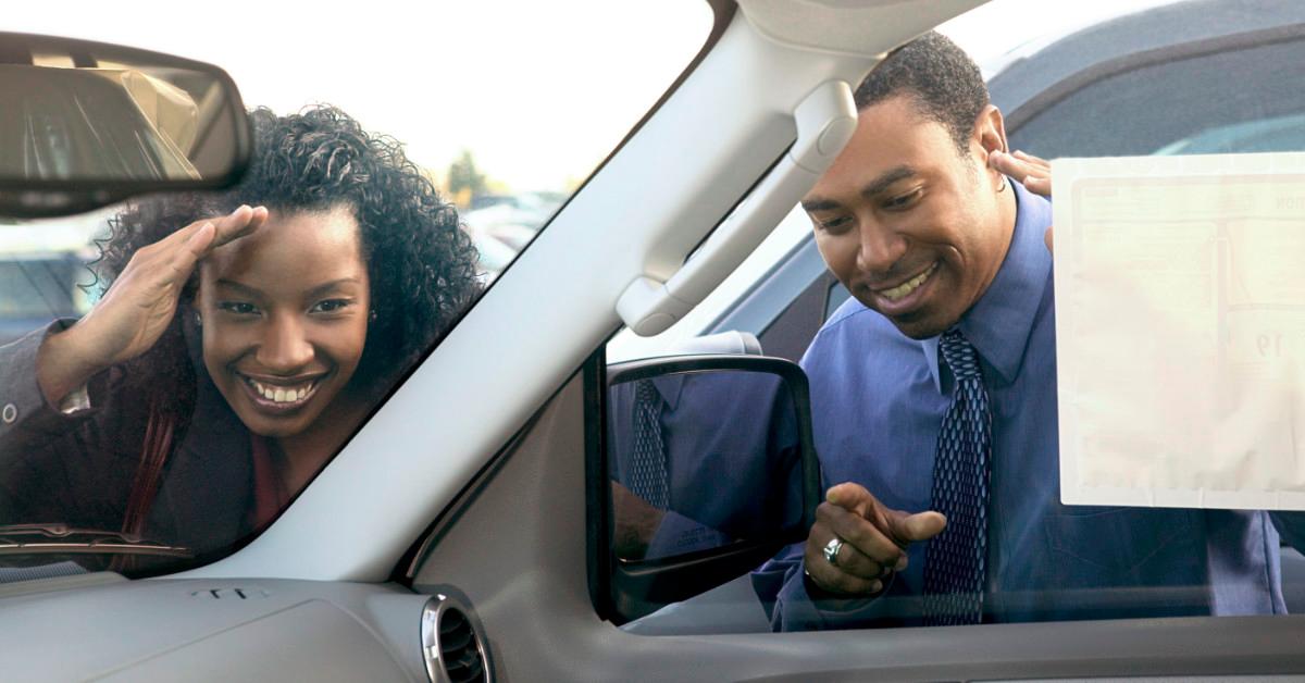 Couple buying a car