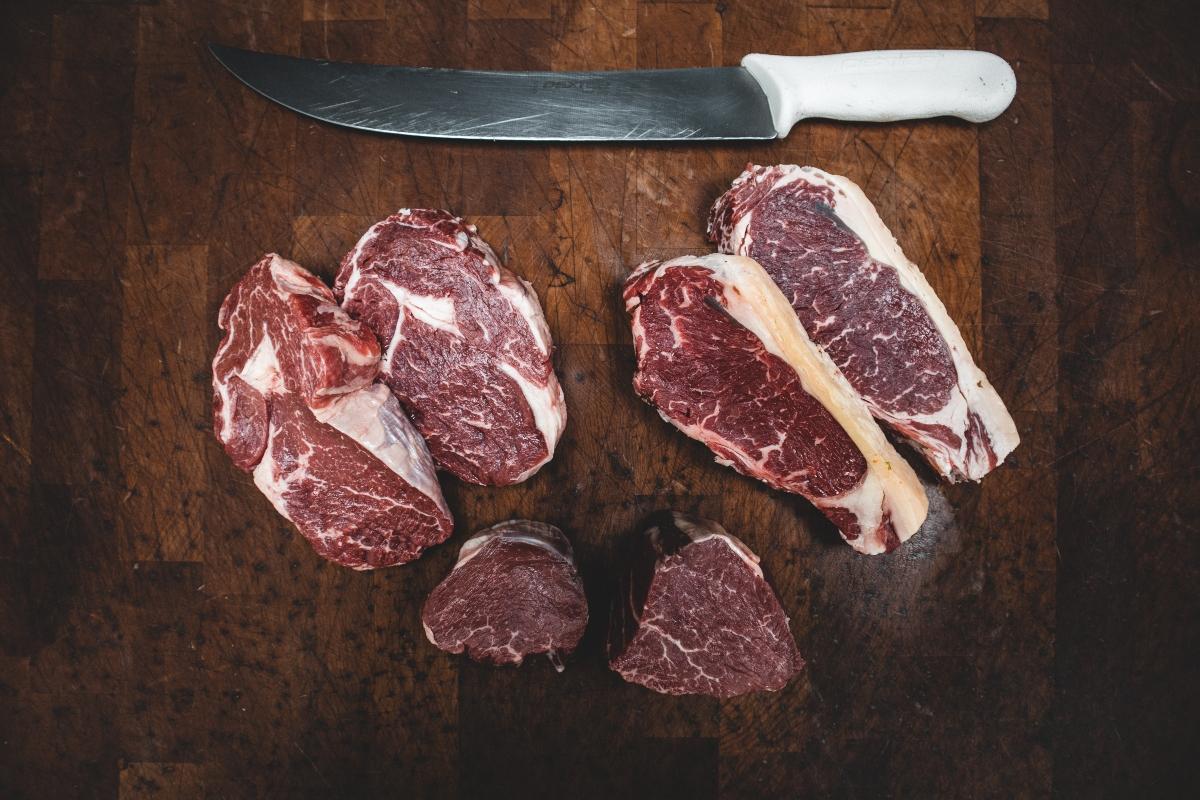 Raw meat on butcher block