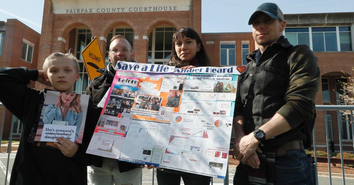 Supporters of Amber Heard stand in front of courthouse 