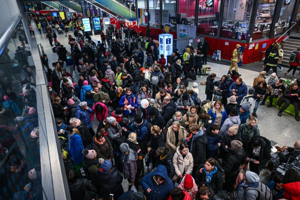 Ukrainian refugees in Krakow, Poland, being relocated to Berlin.