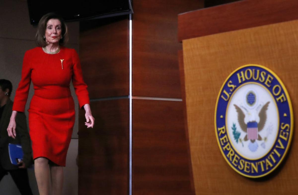 Nancy Pelosi wearing her pin