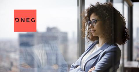 Woman looking out a window and DNEG logo