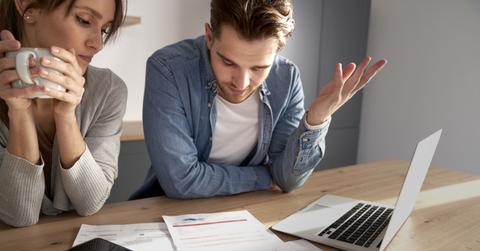 A couple discussing bankruptcy vs. debt consolidation