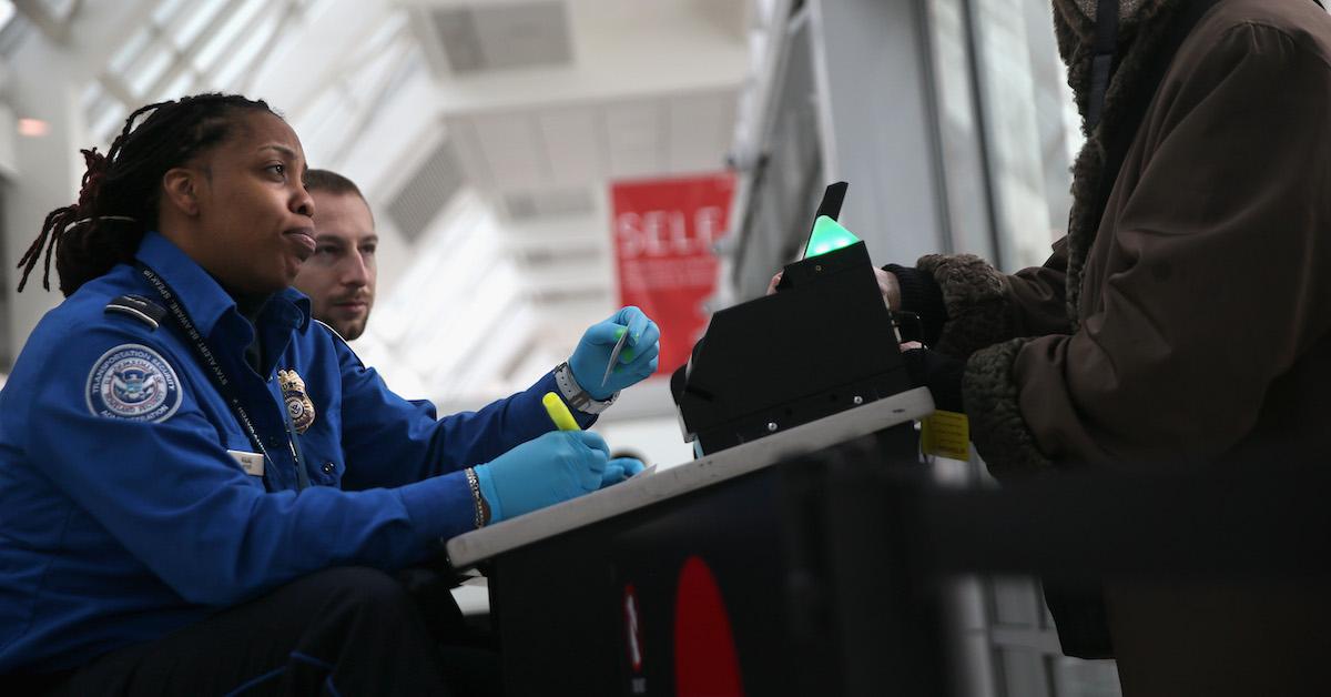 tsa agent looks over id