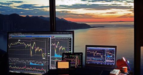 Computer and laptop on table