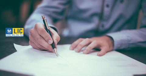 A person filling out forms