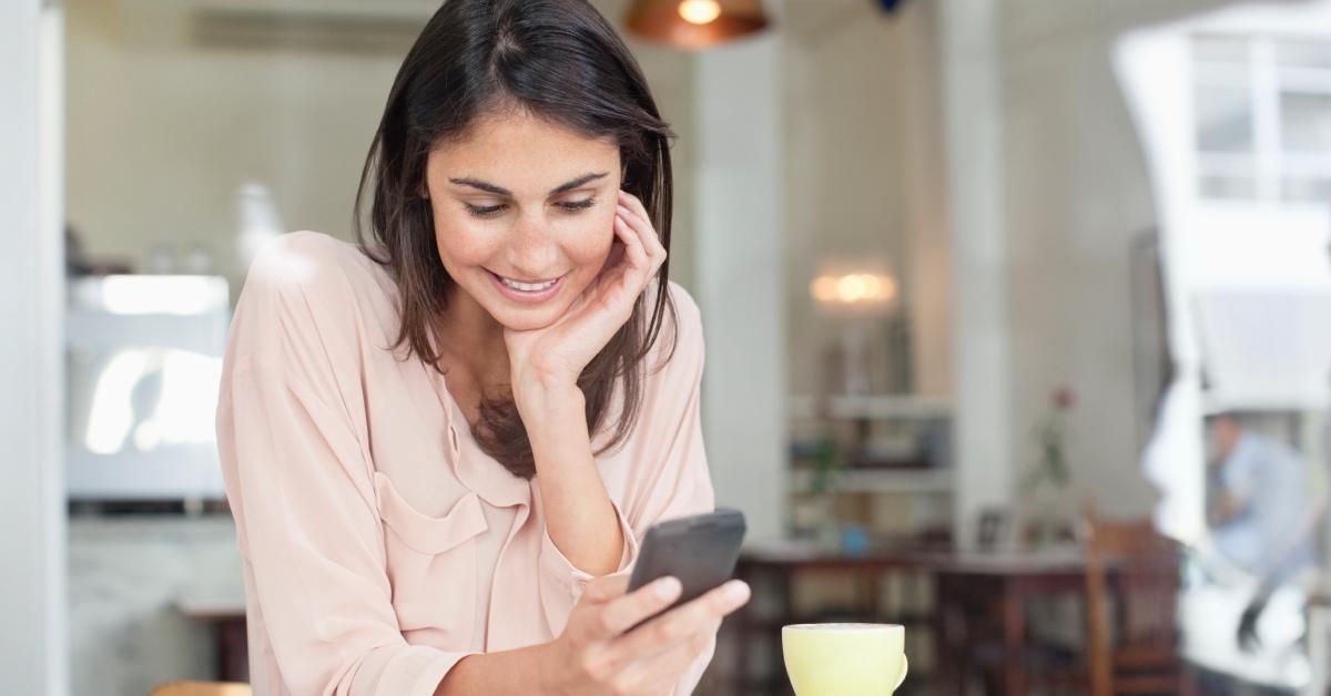 Woman chatting with someone online.