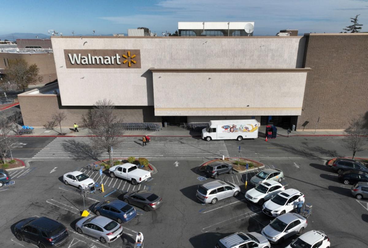 A Walmart store exterior and parking lot