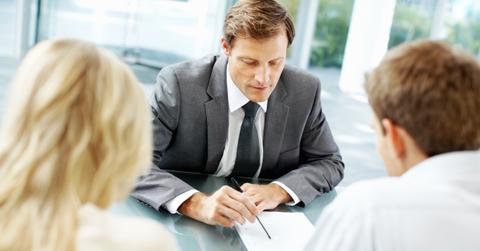 Financial adviser with clients