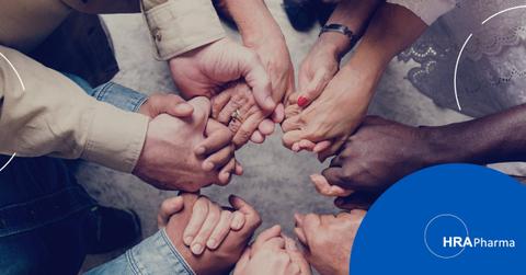 HRA Pharma logo and people holding hands