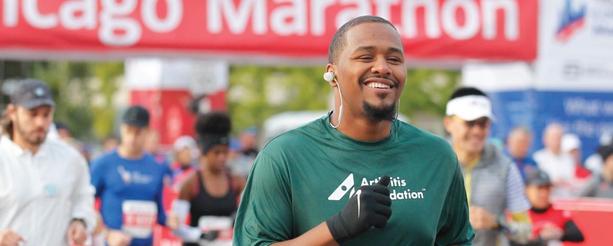 Chicago Marathon runner in a green t-shirt