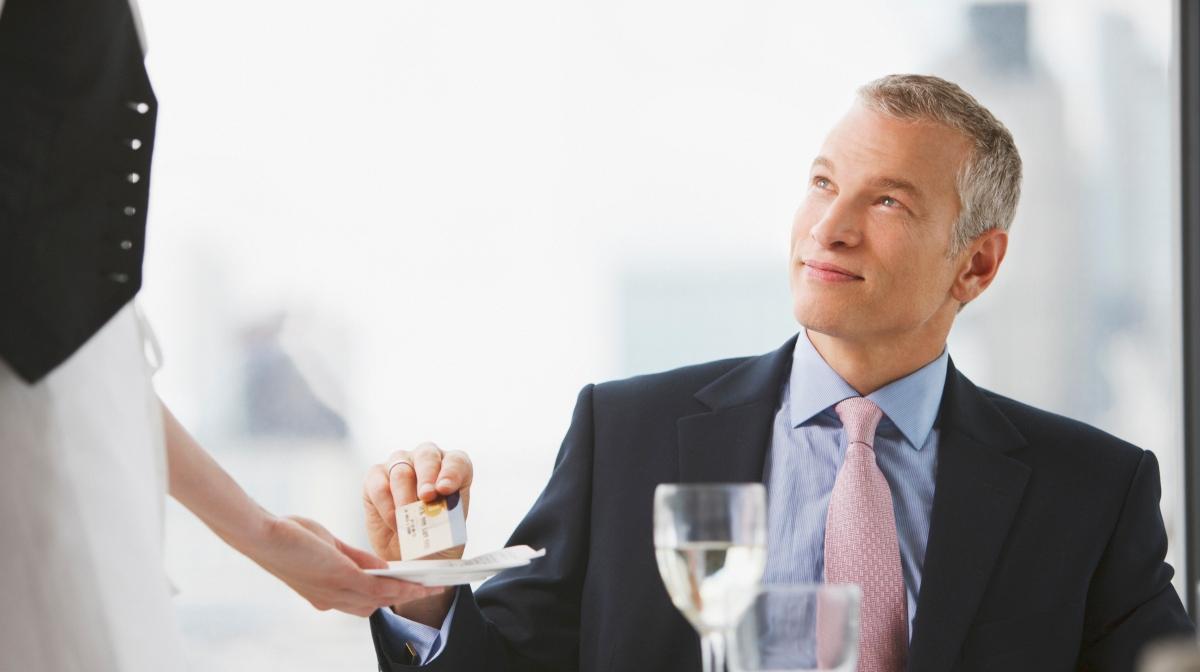 A man paying with a credit card