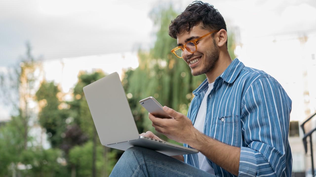 A man looking at salary information