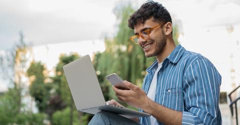 A man looking at salary information