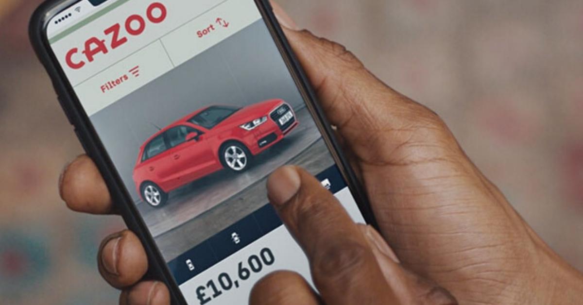 A smartphone displaying Cazoo, an online used car dealer