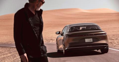 Man looking at the Lucid Air sedan