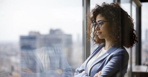 Businesswoman looking out a window