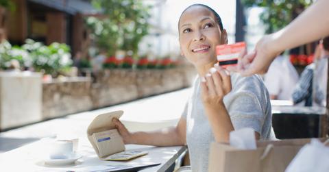 Woman using credit card