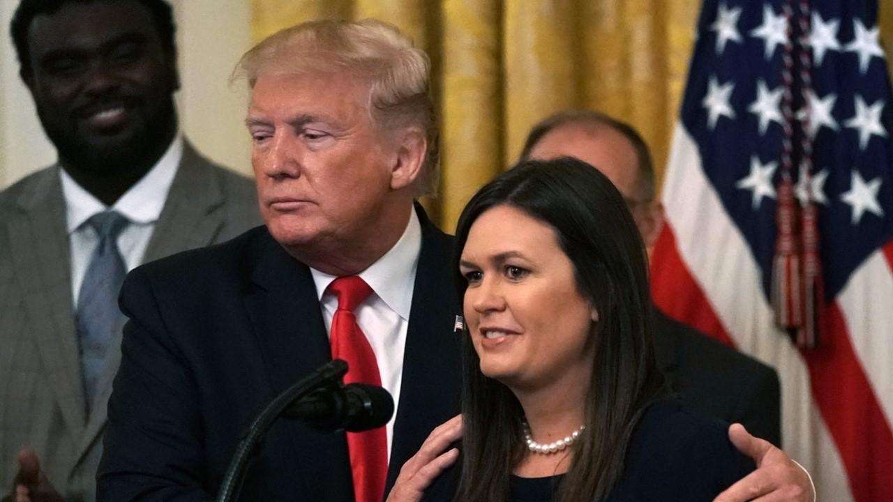 Donald Trump and Sarah Huckabee Sanders