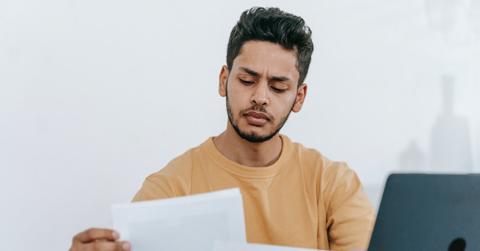 Man looking through documents