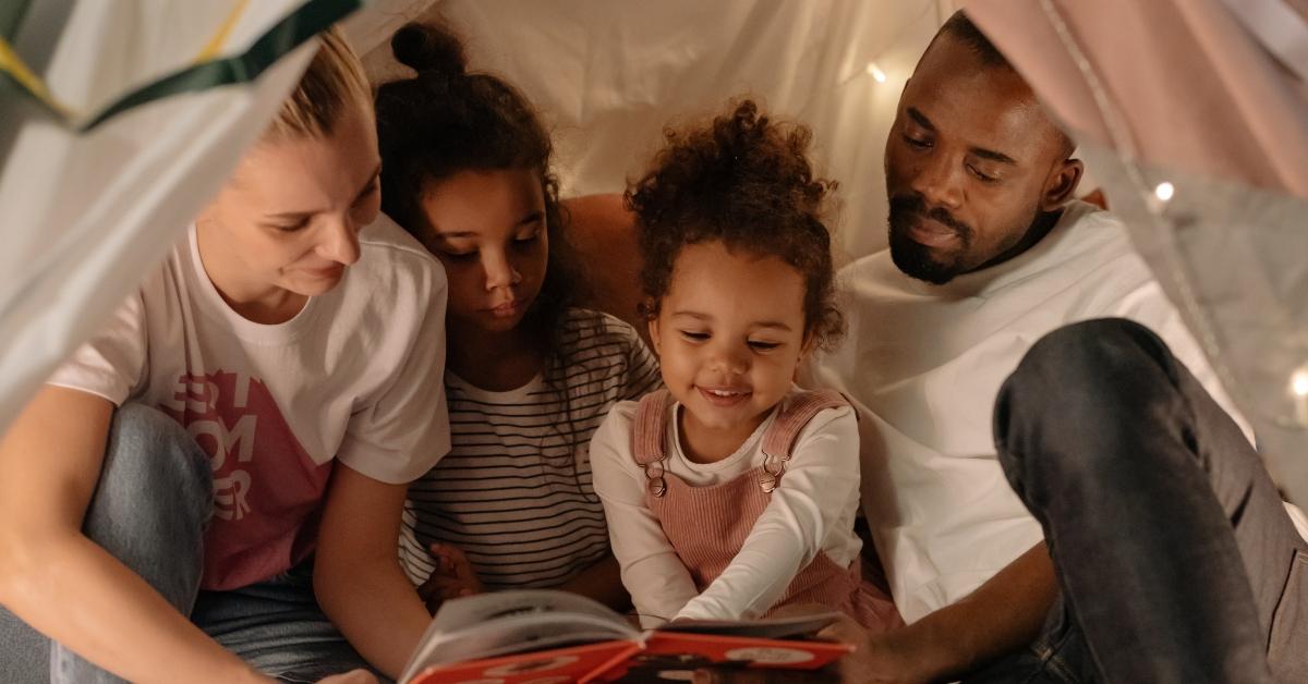 Parents reading to their children