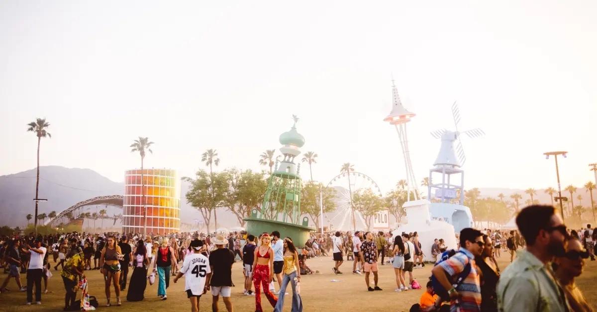 People walking around at the Coachella music festival.