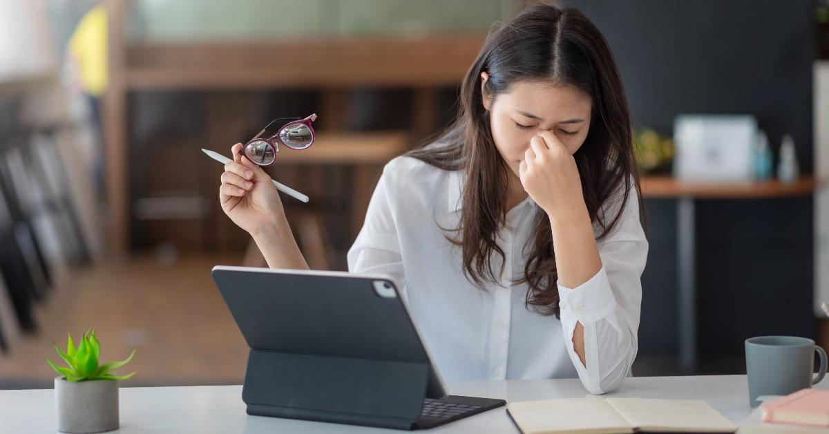 A frustrated woman on tablet