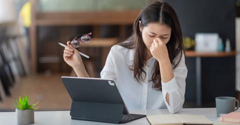 A frustrated woman on tablet