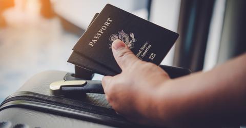 A person holding passports