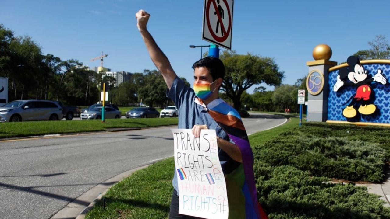 Man protesting outside of Walt Disney World