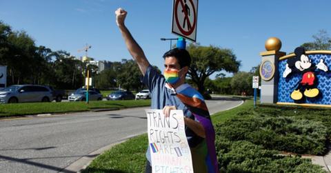 Man protesting outside of Walt Disney World