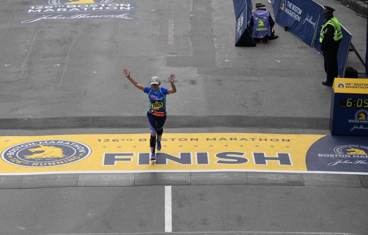 Boston Marathon runner at the finish line