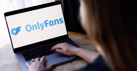 A woman logging into OnlyFans