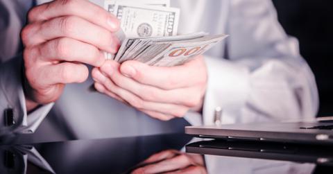 uploads///banker counting cash money