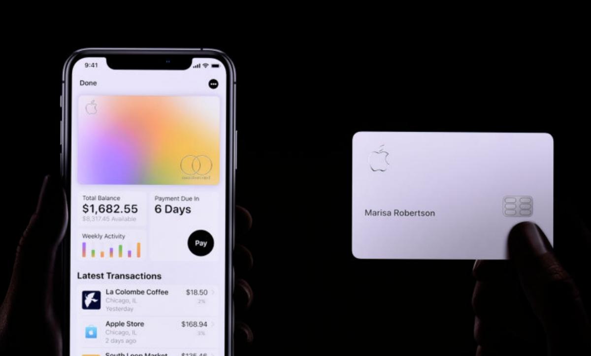 An Apple Savings account on an iPhone and a Apple Card displayed during an Apple Card presentation in 2019