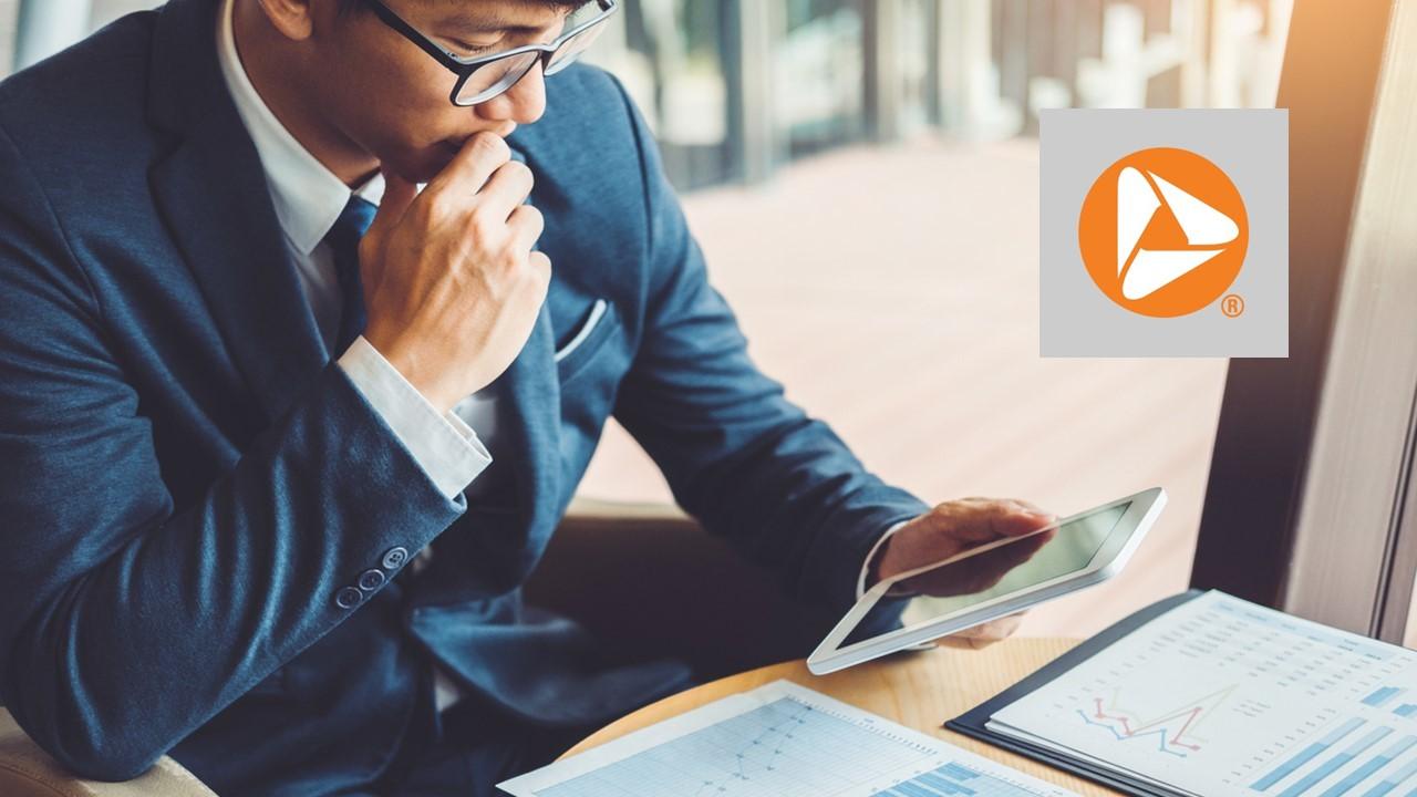 Man looking at a tablet and PNC Bank logo