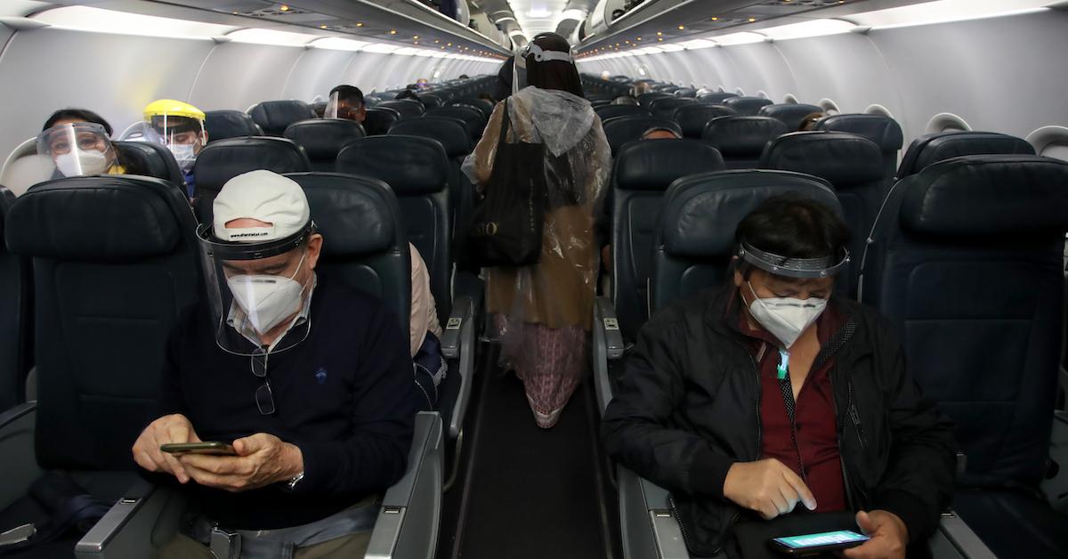 Passengers on flight wearing masks.