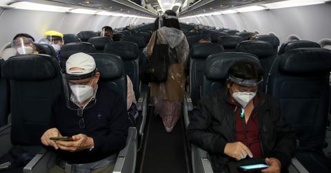 Passengers on flight wearing masks.