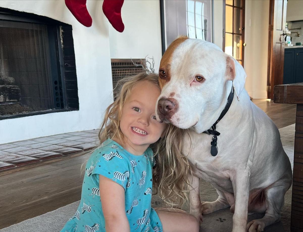 Nunes and Krupa's daughter and dog 