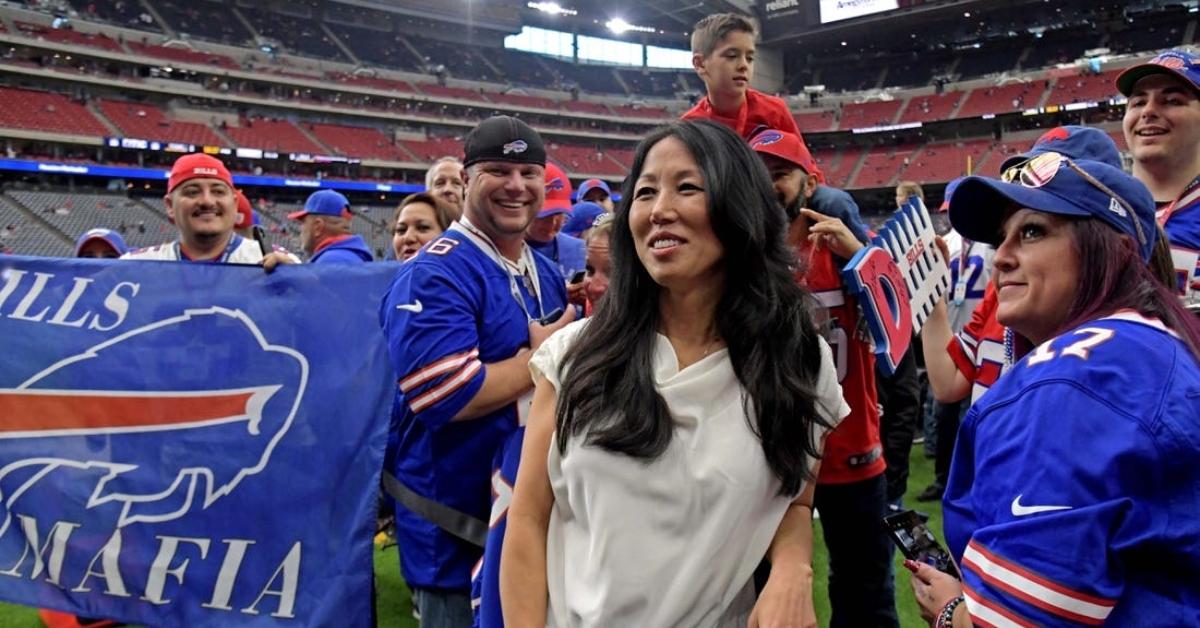 Kim Pegula posing with the Buffalo Bills