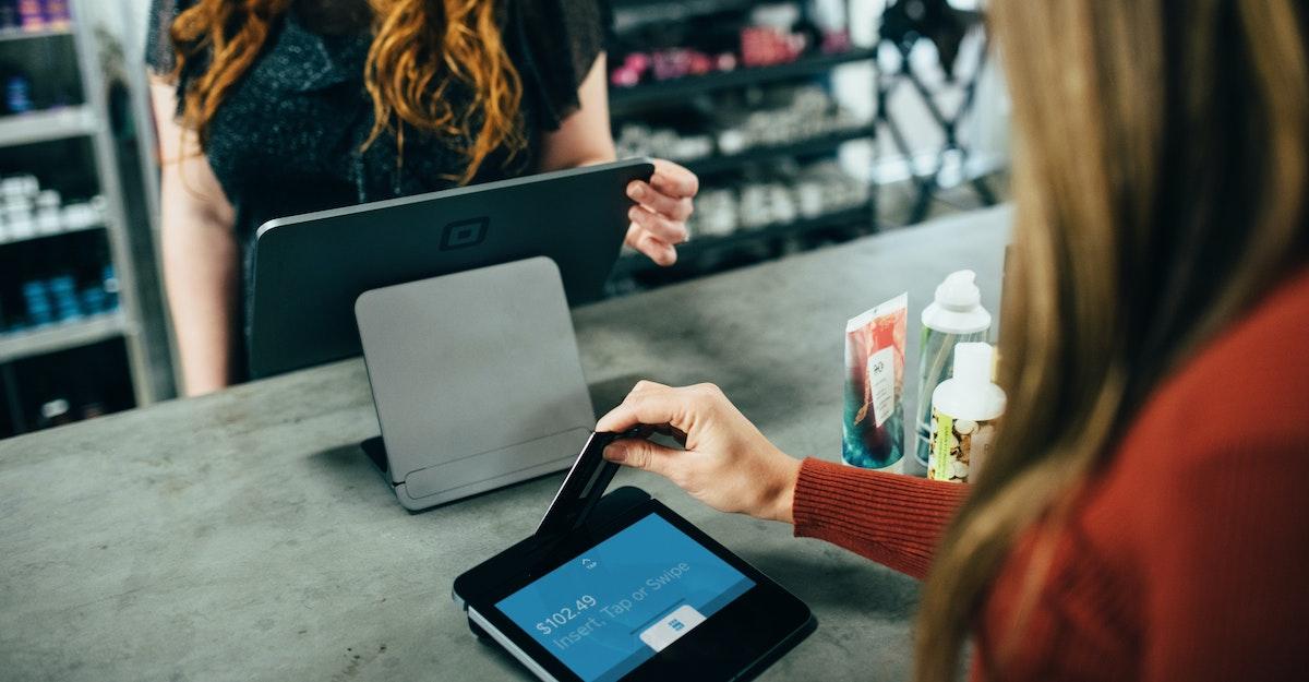 Person pays for items at a store