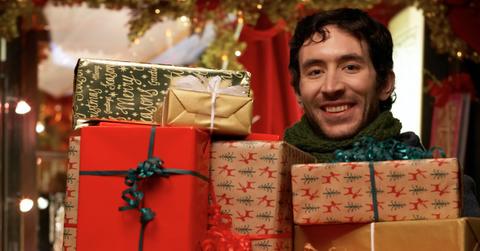 A man with Christmas presents