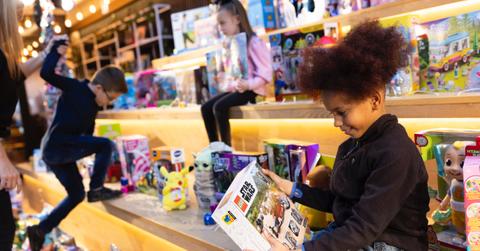 Children looking a toys