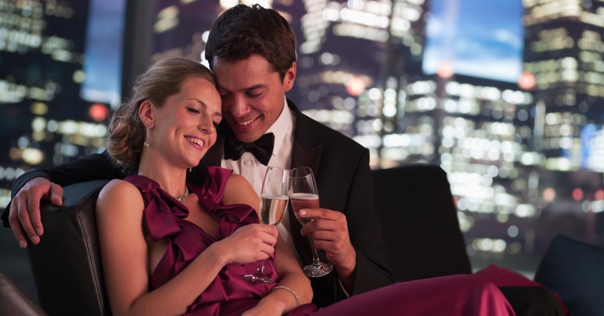 A couple on a condo balcony