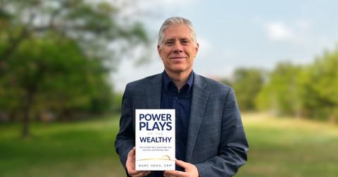 marc henn with his book